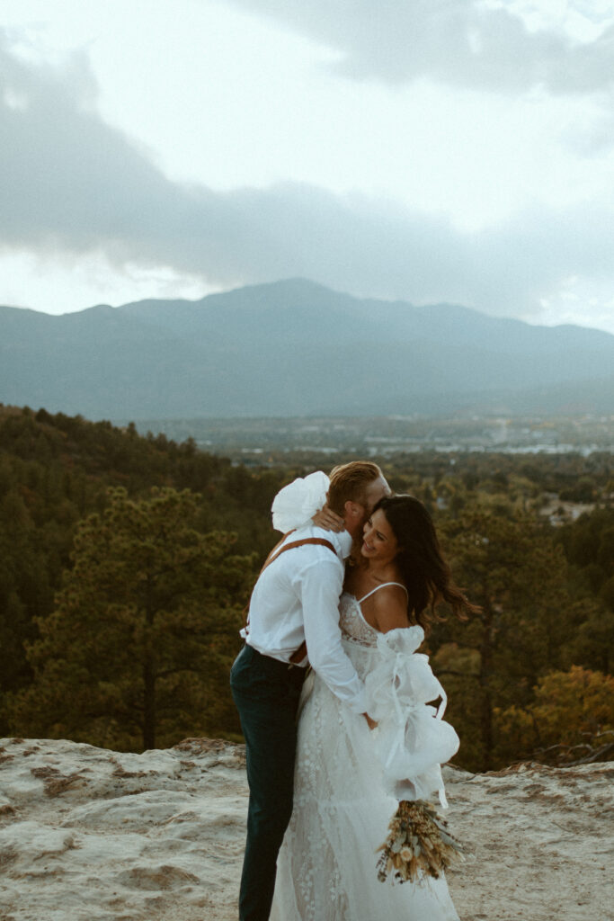intimate Colorado Elopement overlooking Pike Peak in beautiful Colorado Springs. Blue Mountain Tone Wedding inspiration.