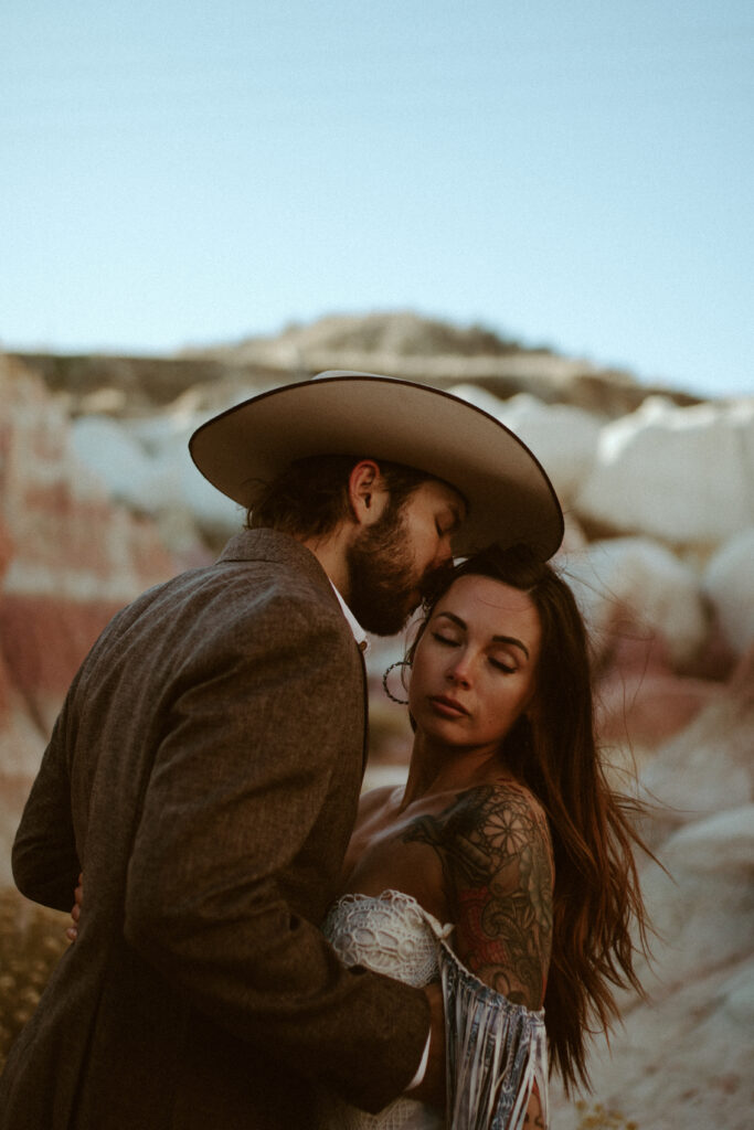 Bohemian western Bridals at the colorado paint mines. Boho Western Elopement Photographed by kinseylynn photo co a Jackson Hole Wedding and Elopement photographer. Rue De Seine Bridal wedding gown. South western style elopement.