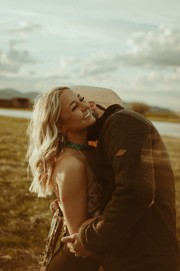 Golden hour in a Wyoming Meadow. Jackson Hole Couples Photographer. Jackson Hole Videographer. Wyomings Best Photographers. Jackson Hole Wedding and Elopements. Western Portraits. 