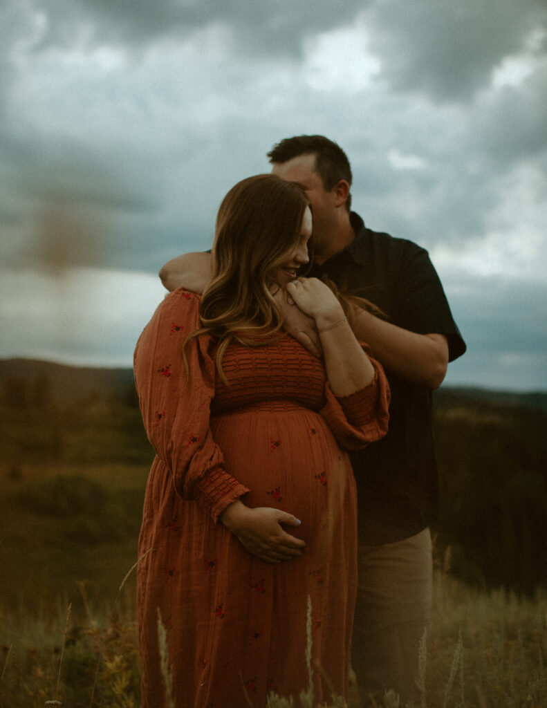 Cortnee + Nick Cloudy Wyoming Maternity. A Team of Wedding and Elopement Photographers focused on all your raw and authentic moments. Nestled near Jackson Hole, Wyoming and Grand Teton. Capturing everything from the booty grabs to the blurry accidents. You deserve to have a truly meaningful and unique stress-free experience, and to get goosebumps when you see your photos filled with genuine emotion.

Luxury wedding cinema & photography, located in Jackson Hole, Wyoming. Kenzies team specializes in making regular people look like a work of art. Adding a romantic vintage feel while still capturing those timeless moments in order to make your wedding day extraordinary.  She will get to know your vision inside and out by sharing Pinterest boards and styling your perfect moments so you don't have to. On top of that works with the best in Jackson Hole Bridal Beauty Hair & Makeup By Tanya LLC, and will point you towards the best wedding vendors in Jackson Hole and Grand Teton. 
here for the hippies 
let's plan your experience
and the cowboys,

HOW WE CAN WORK TOGETHER
Wedding & Elopement Photography
Boudoir Photography
Headshot photography
Kinseylynnphoto Co 
Wedding & Elopement Videography + Super 8 Film