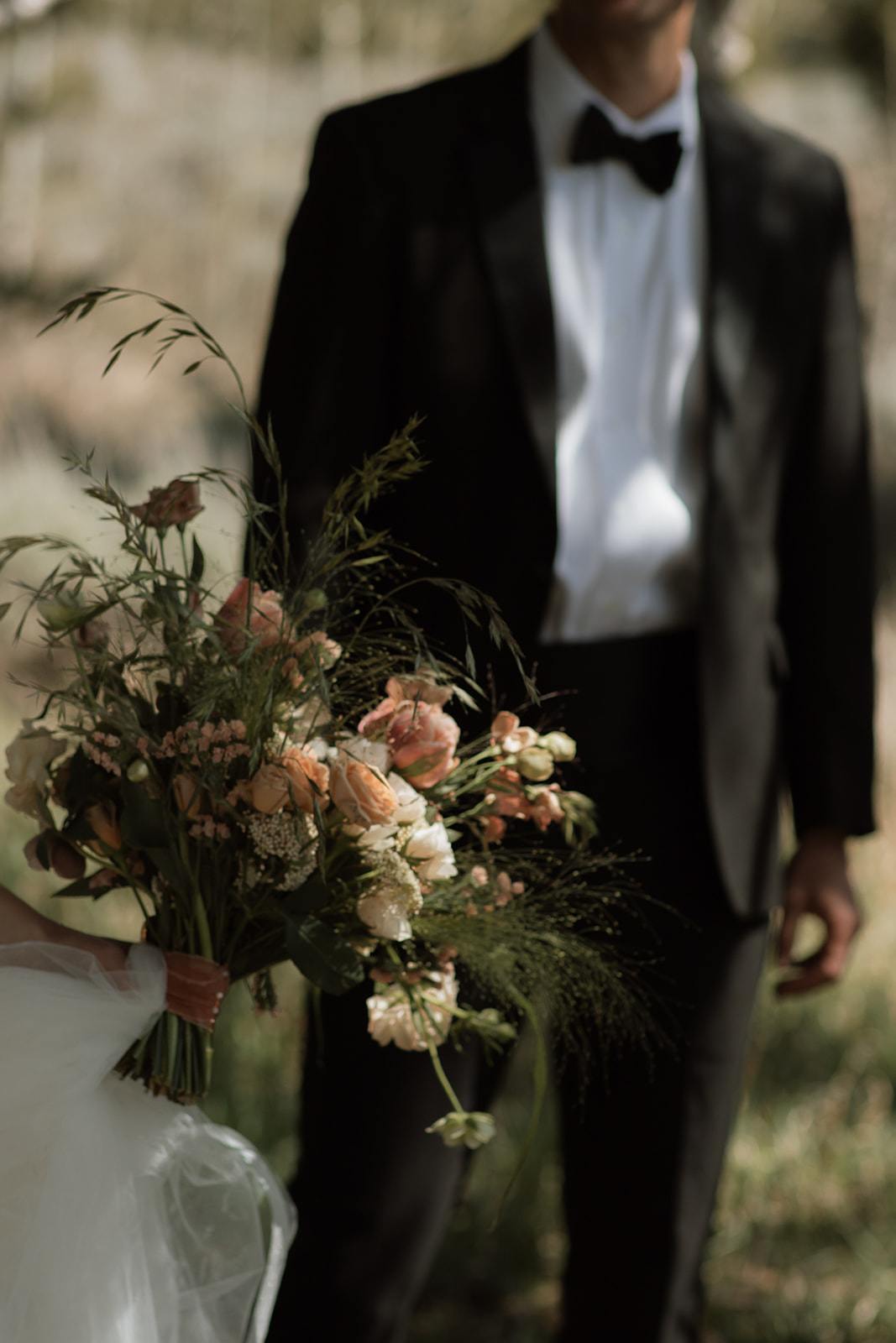 Summer elopement bridal bouquet with pink and white roses