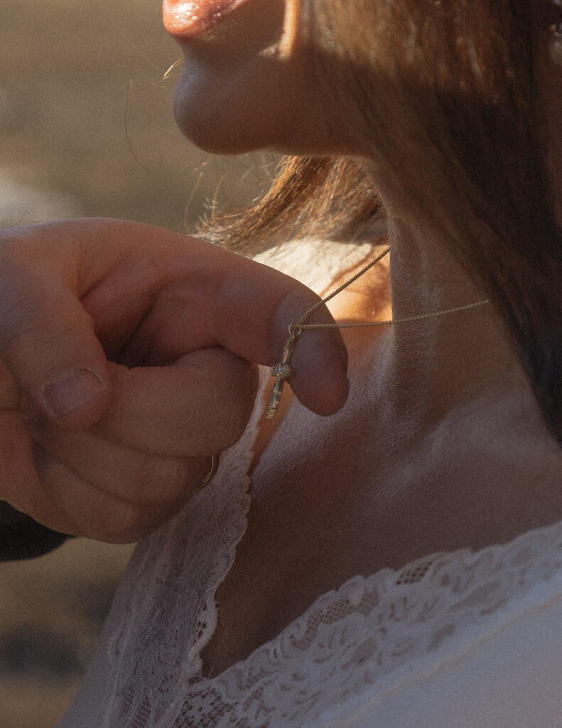 A winter maternity announcement at Mormon Row in Grand Teton National Park, captured through cinematic videography in Jackson Hole, Wyoming.